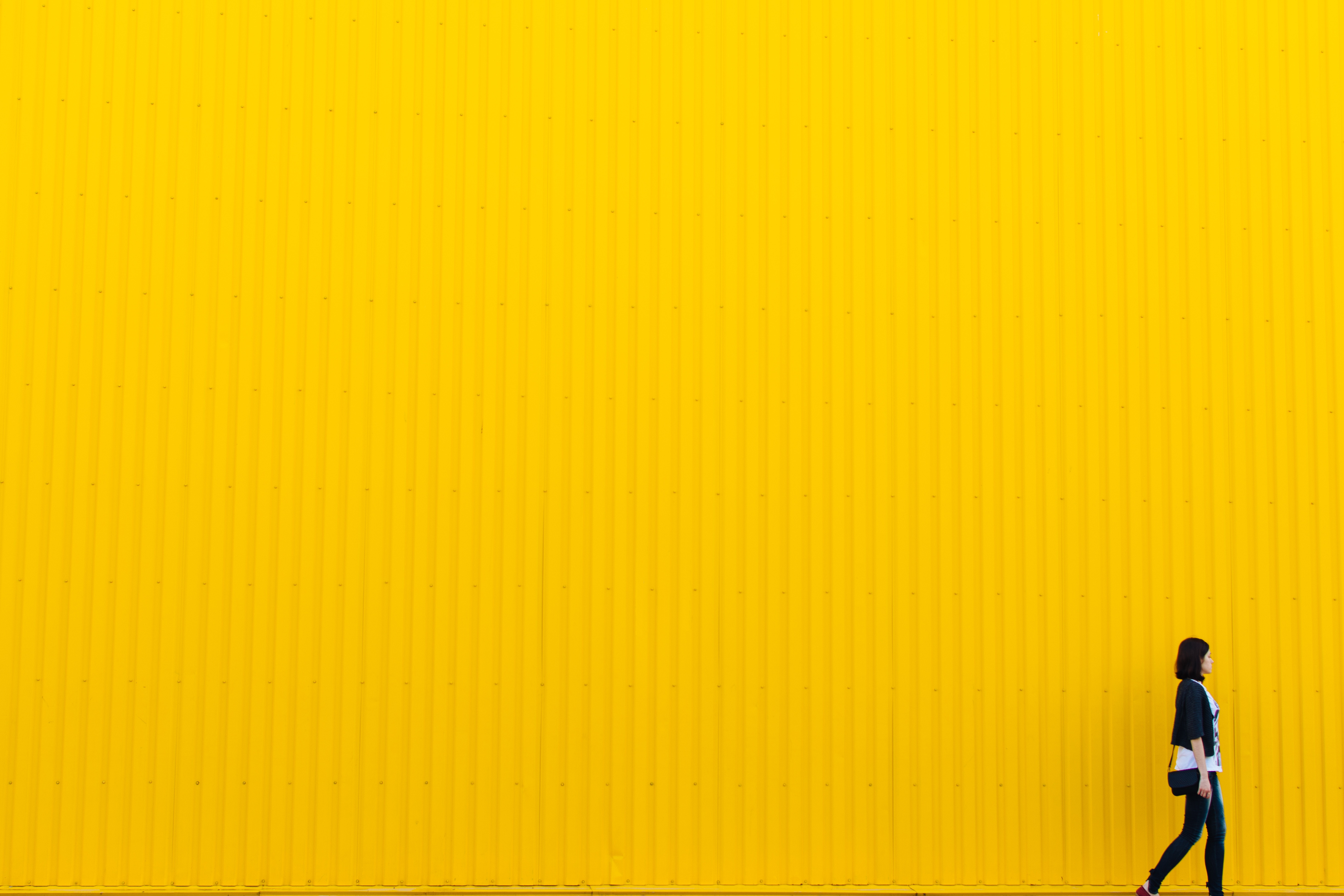 yellow wall and person